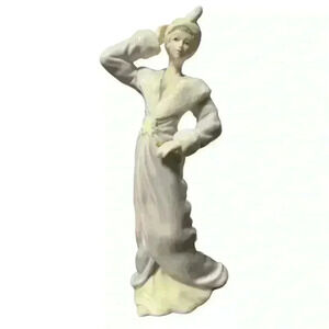 Pretty porcelain lady statuette